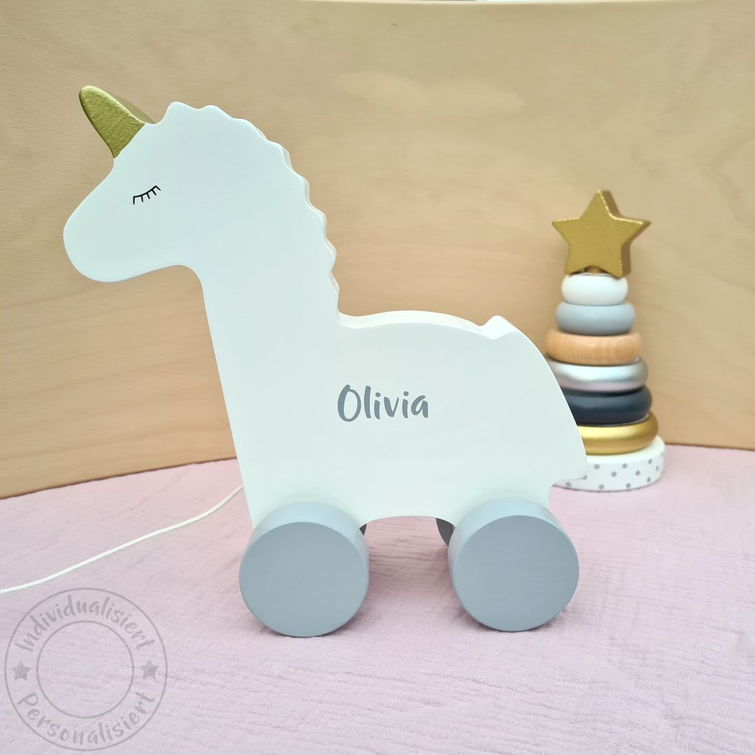 Pull-along toy unicorn, white wood | JaBaDaBaDo
