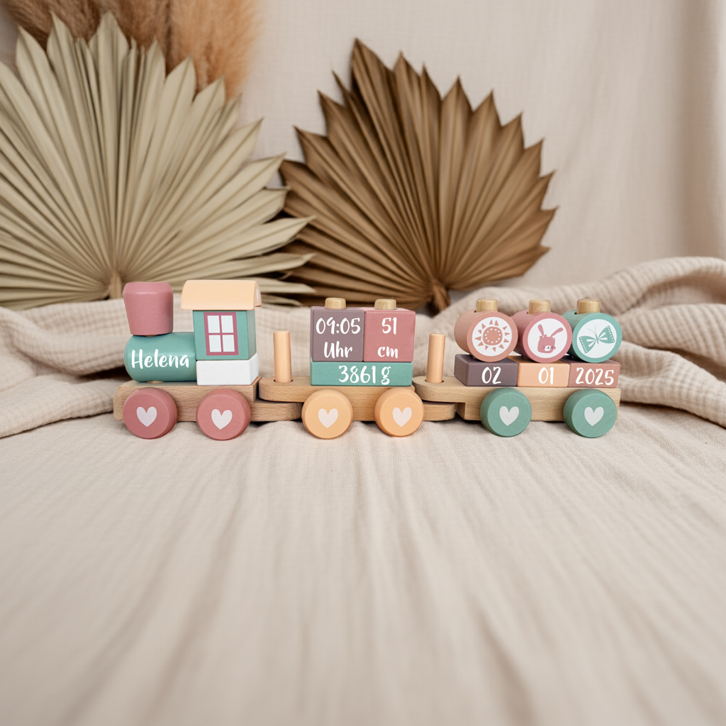 Holz-Zug in Rosa und Pink personalisiert – besonderes Geburtsgeschenk
